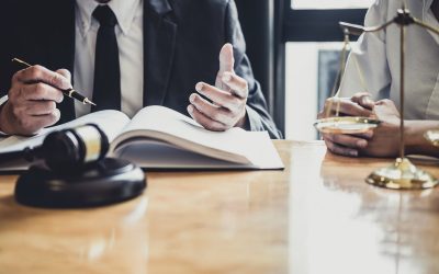 male-lawyer-or-counselor-working-in-courtroom-have-meeting-with-client-are-consultation-with.jpg